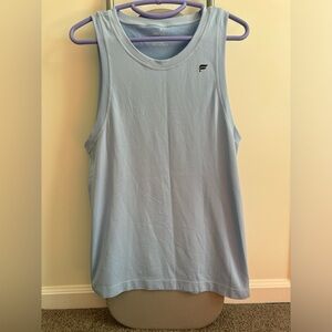 Fabletics green and blue men’s tank tops
